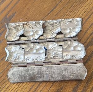Antique chocolate mold. Easter bunny with egg cart